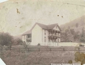 Unidentified House with People on the Porch