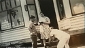 Edna Graham Kisner with Sons on the Steps of  L. E. Kisner General Merchandise in Frank, W.Va.